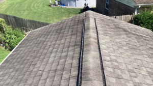 aging roof shingles Virginia Beach home showing curling and worn shingles