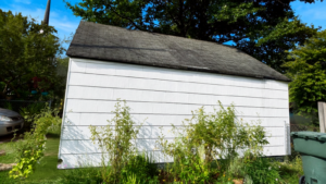 Aging roof Virginia showing weathered shingles and signs of roof damage